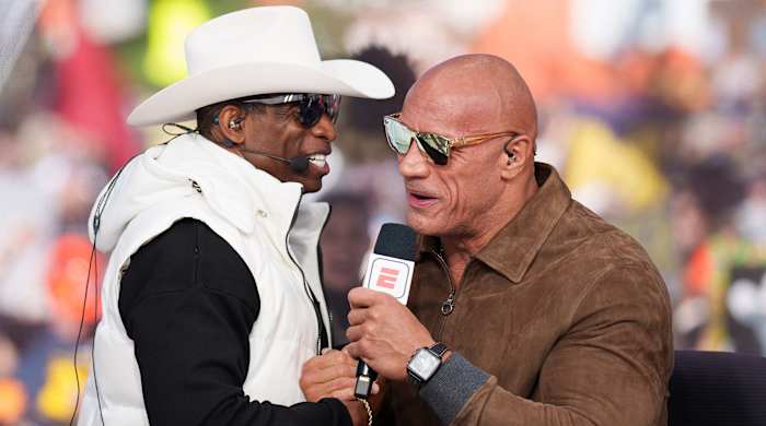 Deion Sanders meeting The Rock.